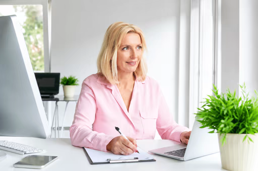 Woman in office handling claim filing and processing